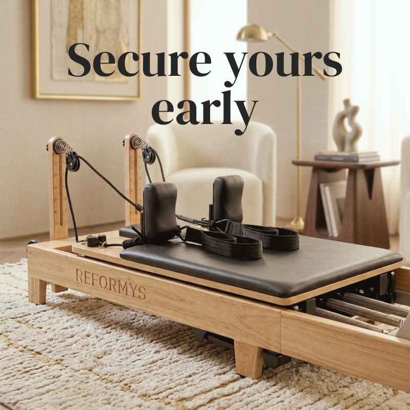 Closer view of Reformys Cloud Assisted Folding Reformer in a cozy, luxurious home lounge with text 'Secure yours early'
