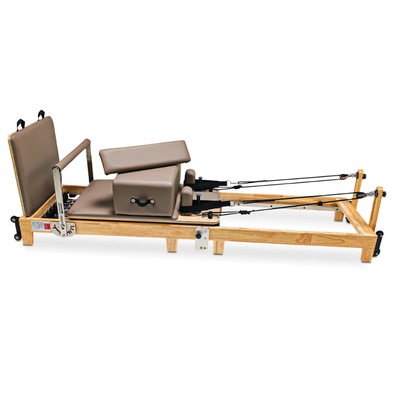 Side view of the Impact Fitness Folding Reformer Pilates Machine in Mocha colour with sitting box and standing platform
