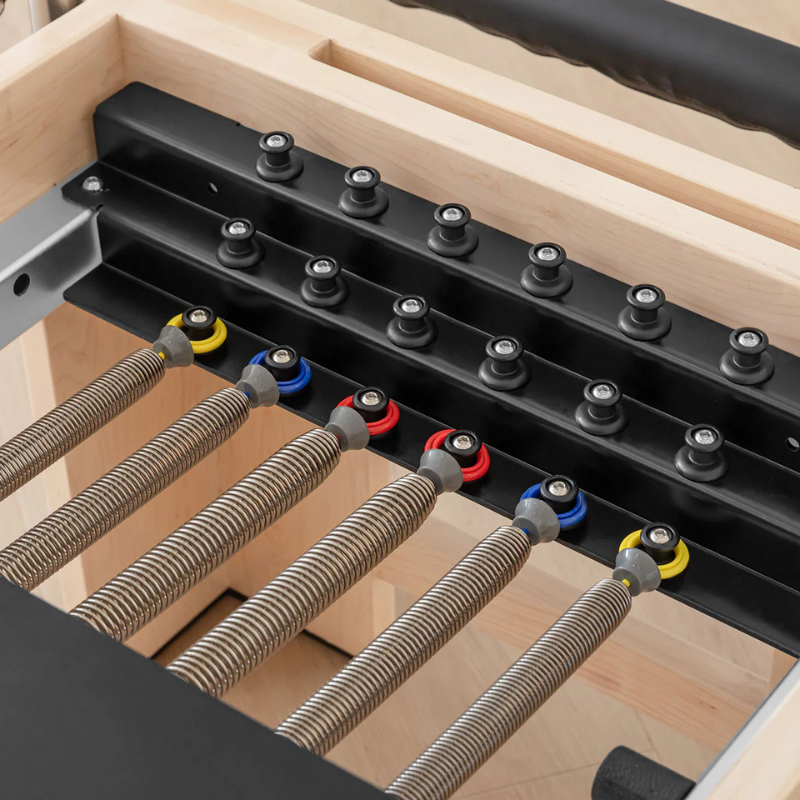 Close-up of the springs on the Lifespan Fitness Contour Cadillac Pilates Reformer