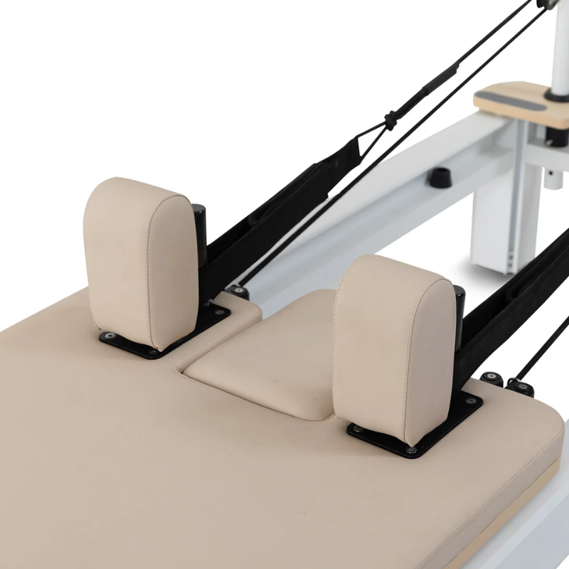 Close-up of the shoulder pads on the contour pro aluminium pilates reformer machine in Beige
