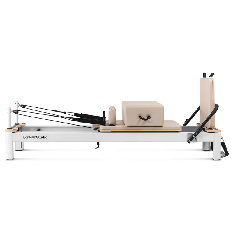Side view of the Lifespan Fitness Contour Studio Commercial Pilates Reformer Machine in Beige colour