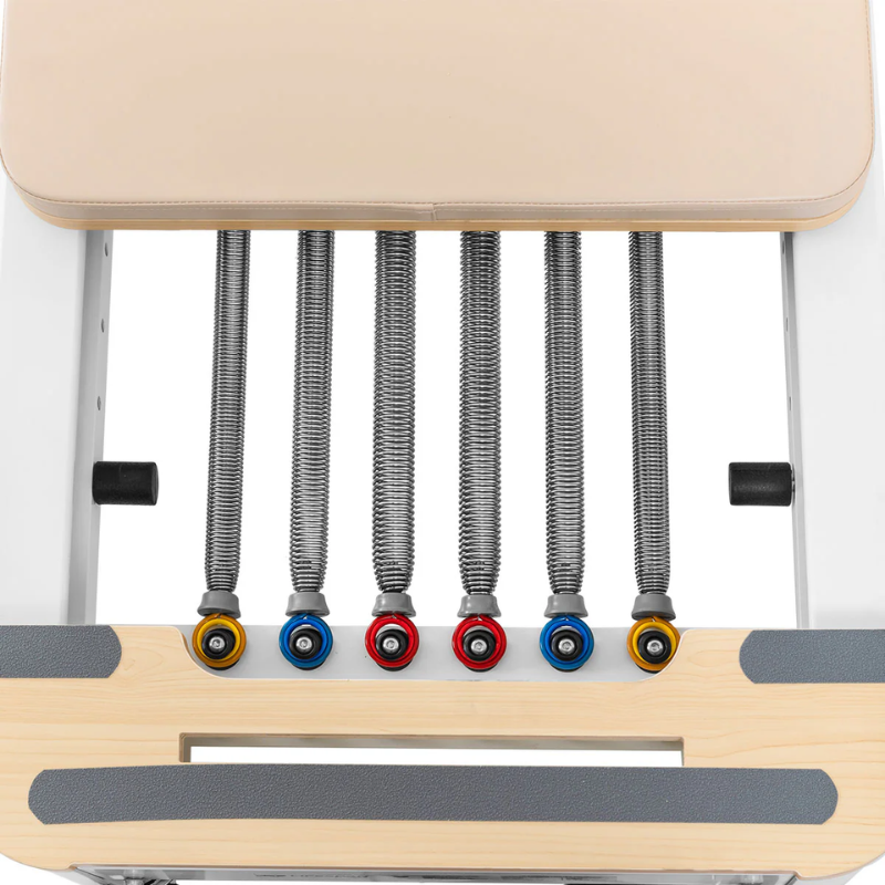 Close-up of the springs on the Lifespan Fitness Contour Studio Commercial Pilates Reformer Machine in Beige colour