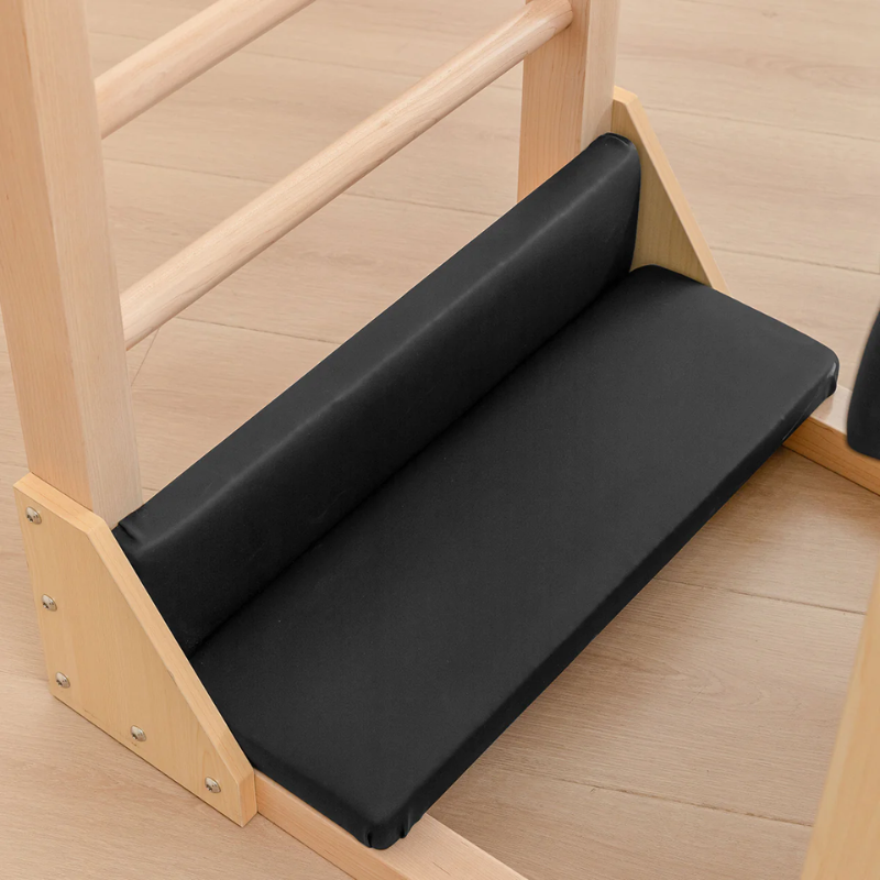 Close-up of the padded foot platform on the Lifespan Fitness Pilates Ladder Barrel