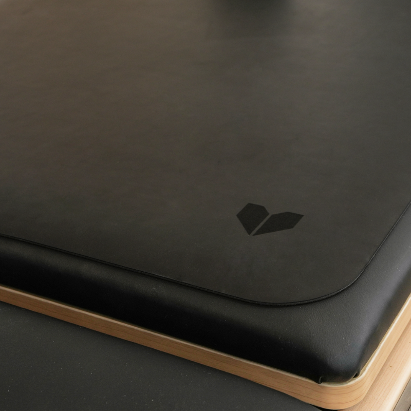 Close-up of the logo on the Lifespan Fitness Pilates Reformer Anti Slip Mat