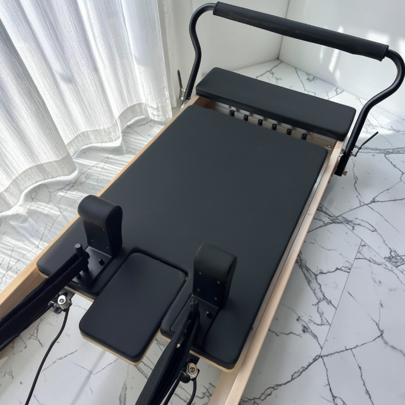 Top angle view of carriage on Milaron Maple V3 Commercial Pilates Reformer