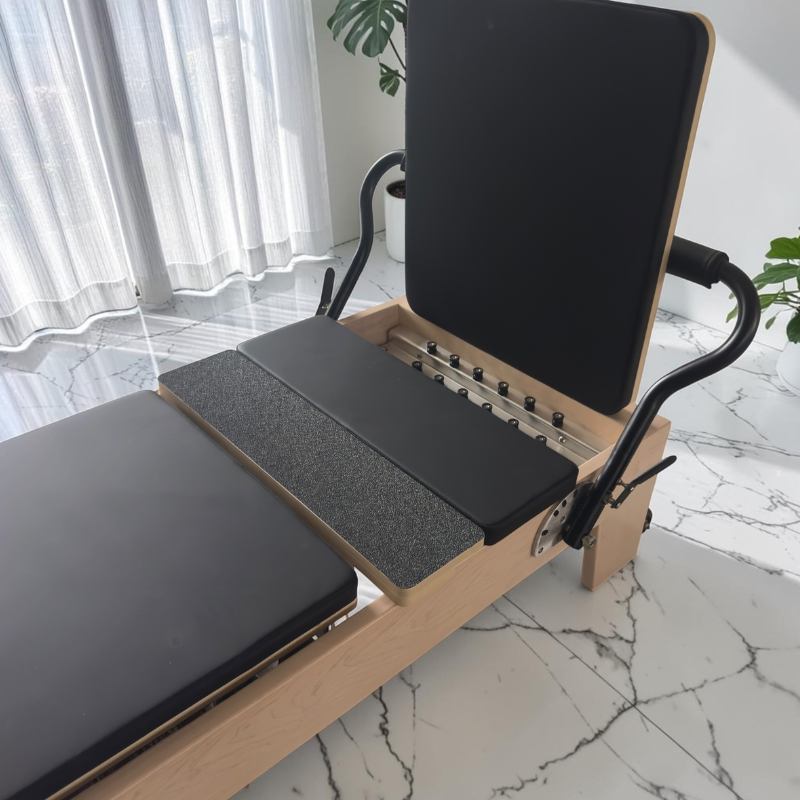 Both grip and padded standing platforms fitted into frame of Milaron Maple V3 Studio Pilates Reformer Machine