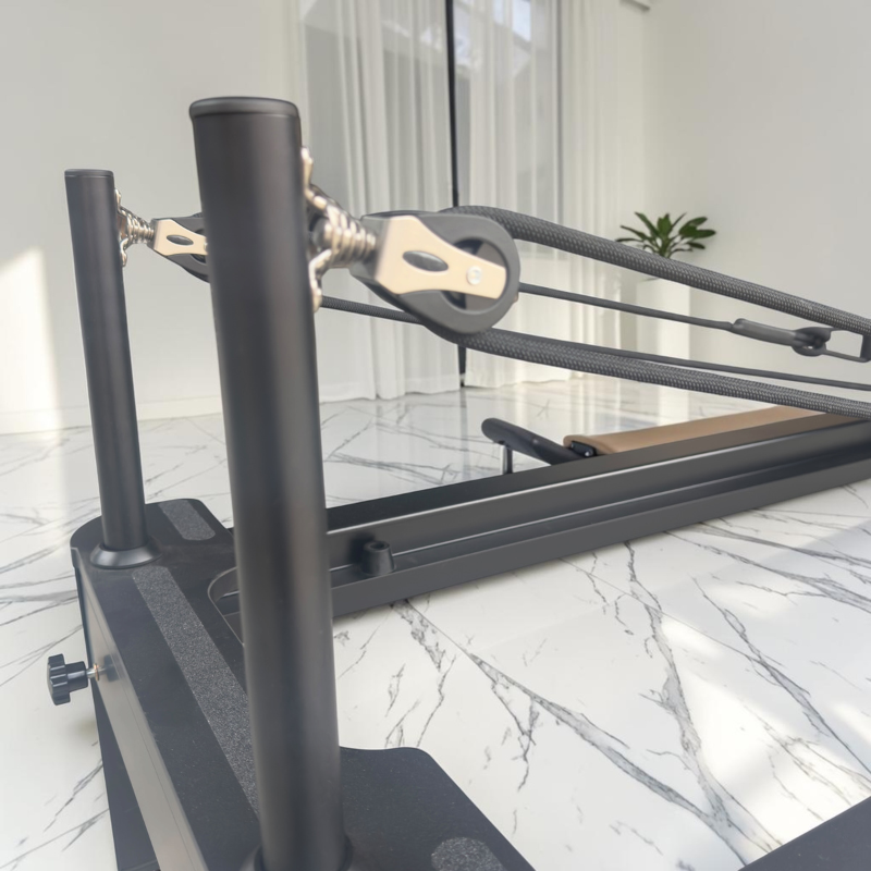 Close-up of pulley risers on Milaron Pearl V3 Studio Pilates Reformer in Noir