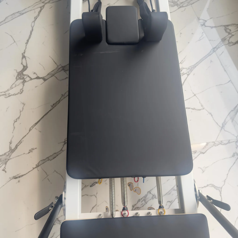 Birds eye view of carriage on Milaron Pearl V3 Studio Pilates Reformer Machine in Original