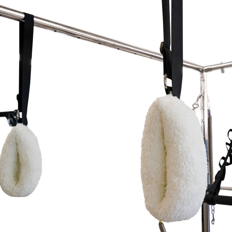 Close-up of the fluffy loop handles on the Reeplex Cadillac Pilates Reformer with Full Trapeze V2