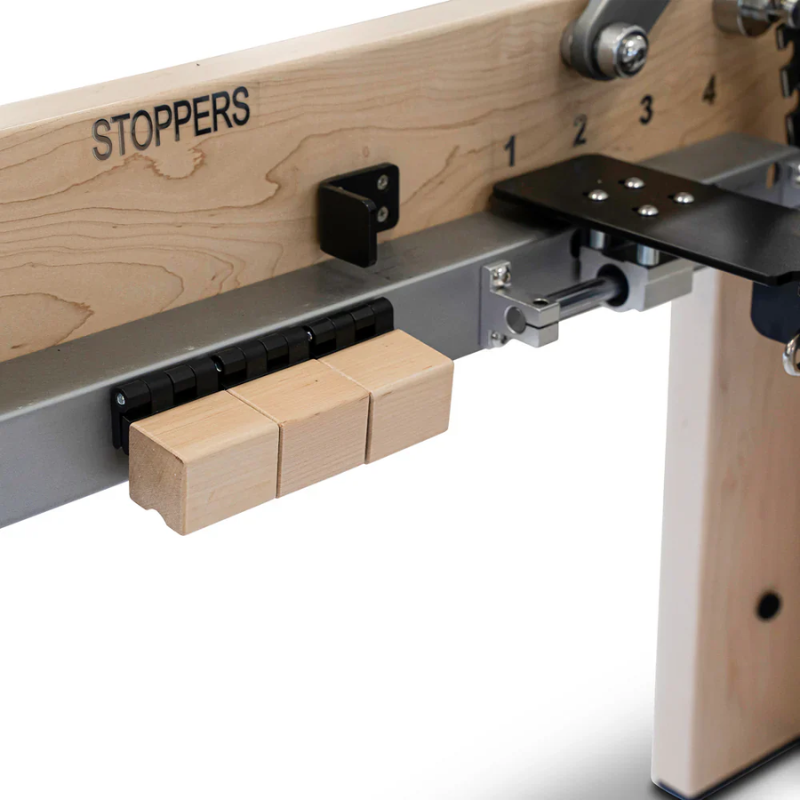 Close-up of the carriage stoppers on Reeplex Cadillac Pilates Reformer with Full Trapeze V2