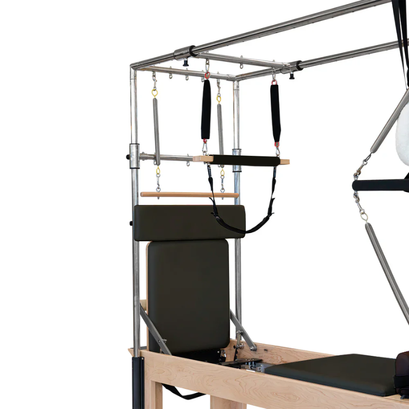 Closer view of the upper trapeze frame and attachments on the Reeplex Cadillac Pilates Reformer with Full Trapeze V2