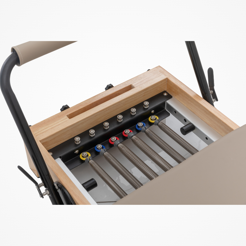 Close-up of six springs on Reformys Cloud Folding Pilates Reformer in Beige