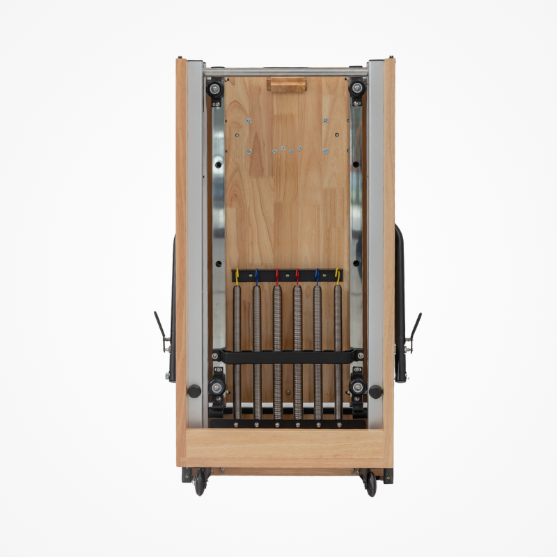 Back view of the Reformys Cloud Folding Pilates Reformer Machine in folded position
