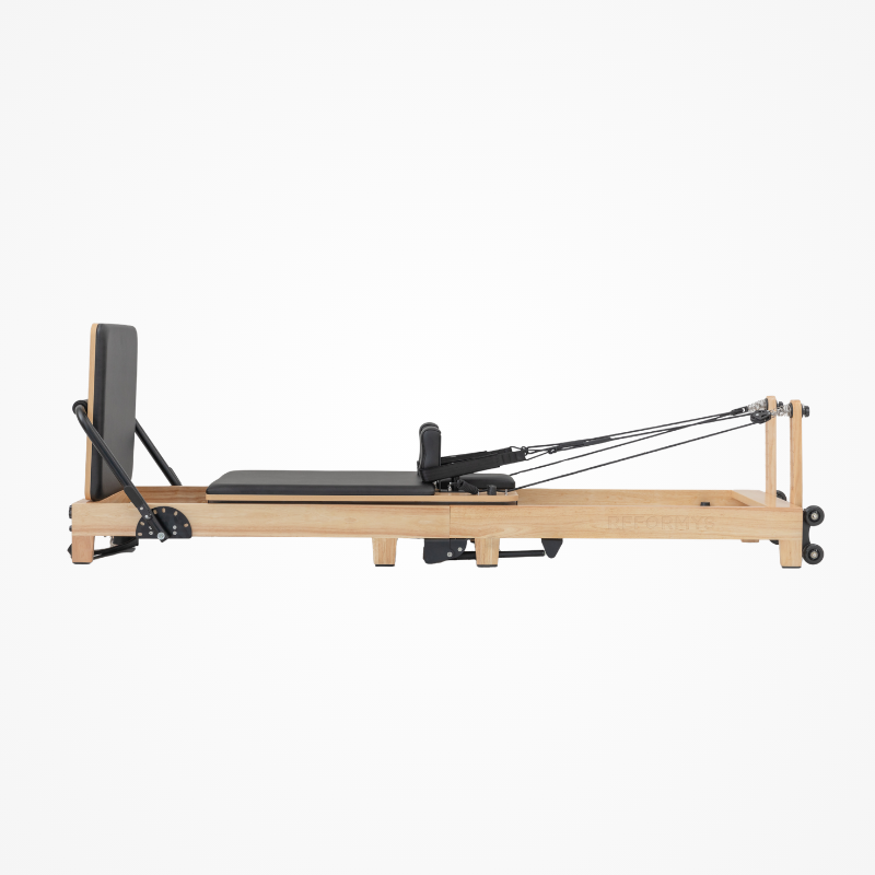 Left side view of the Reformys Cloud Folding Pilates Reformer Machine in Black