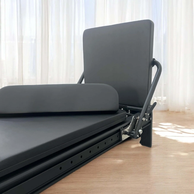 Close-up of the Core Collab Full Track Queen Studio Pilates Machine