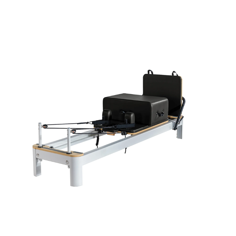 Core Collab The Queen Pilates Reformer in White frame and Black upholstery