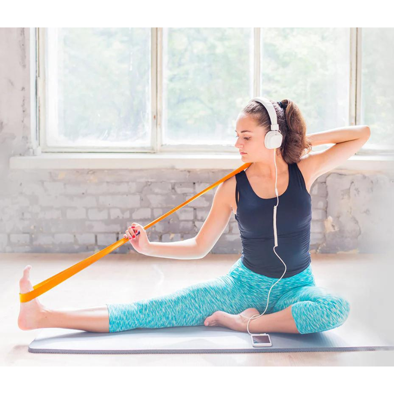 Woman exercising with Cortex Resistance Band Loop 32mm