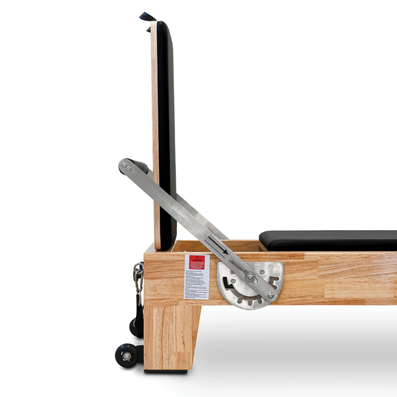 Side view of the jumpboard on Impact Fitness Pilates Reformer with Half Trapeze Tower
