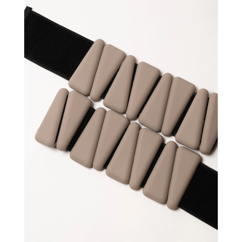 pair of levaïa wrist & ankle weights in classic taupe with white background