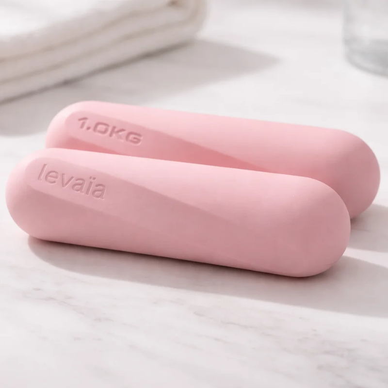 Side view of levaïa lifts - Handheld Pilates Weights Pair in Blush