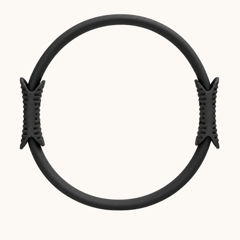 levaïa Pilates Ring in Noir, showing its circular design with two textured handles on opposite sides against a white background.