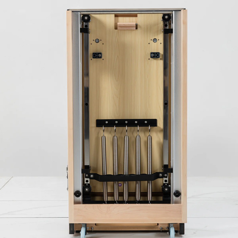 Back view of the Lifespan Fitness Contour Folding Wooden Pilates Reformer Machine in folded state