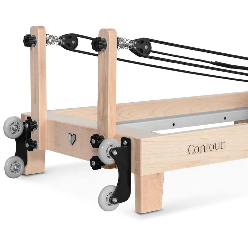 Close-up of the pulleys and wheels on the back of Lifespan Fitness Contour Folding Wooden Pilates Reformer Machine in Black