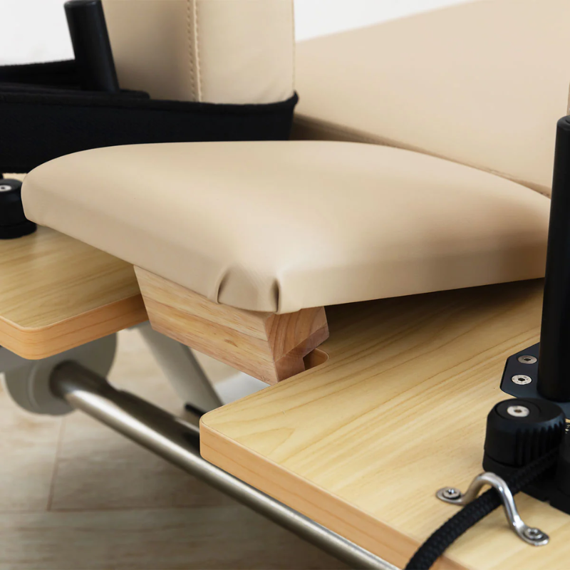 Close-up of the raised headrest on the Lifespan Fitness Contour Pro Folding Pilates Reformer in Beige