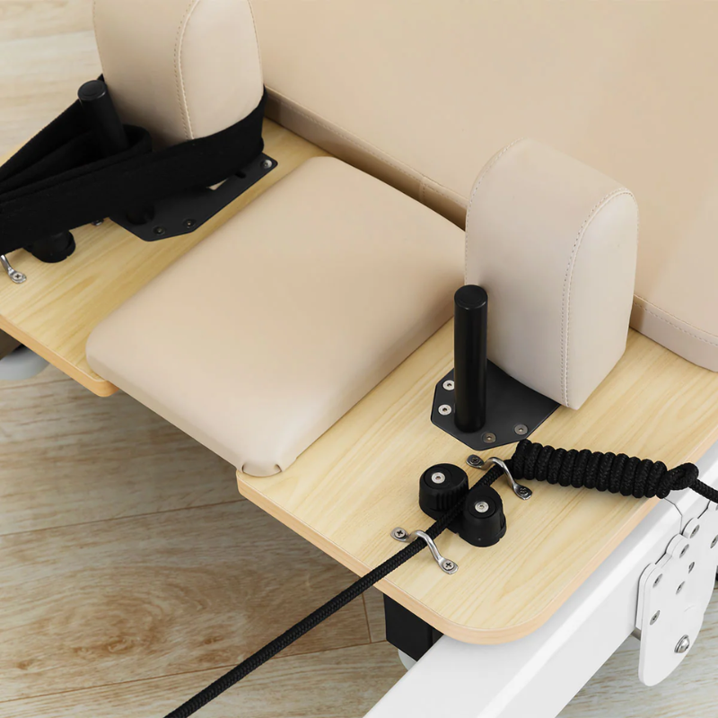 Close-up of the headrest and shoulder blocks on the Lifespan Fitness Contour Pro Aluminium Folding Reformer Pilates Machine in Beige