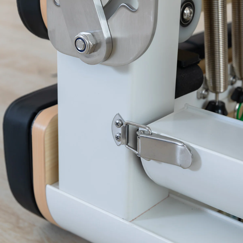 Close-up of the folding lock latch on the Lifespan Fitness Contour Pro Aluminium Folded Pilates Reformer Machine in Black