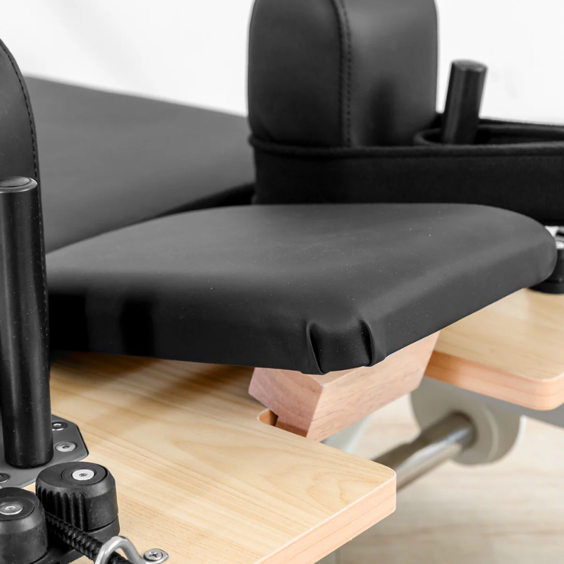 Close-of the raised headrest on the Lifespan Fitness Contour Pro Aluminium Folded Pilates Reformer Machine in black
