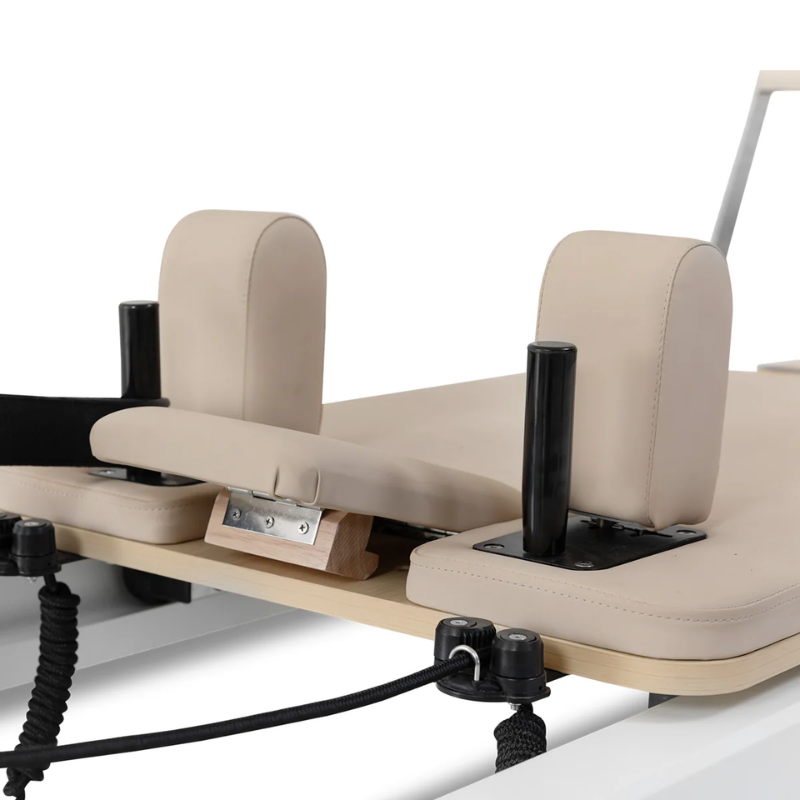 Close-up of the headrest and shoulder pads on the Lifespan Fitness Contour Pro Aluminium Pilates Reformer Machine in Beige