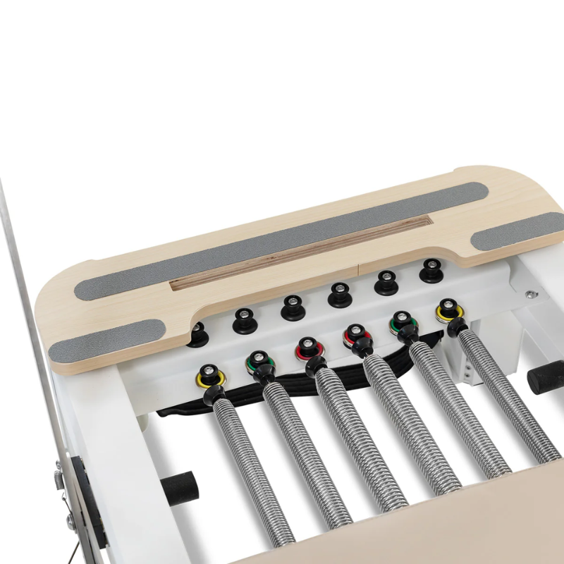 Close-up of the springs on the lifespan fitness contour pro studio aluminium reformer pilates bed set in Beige