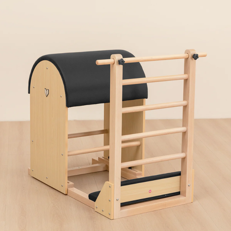 Angled front view of the Lifespan Fitness Pilates Ladder Barrel in a studio