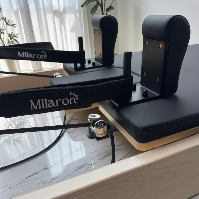 Double-loop handles on Milaron Maple V3 Commercial Pilates Reformer