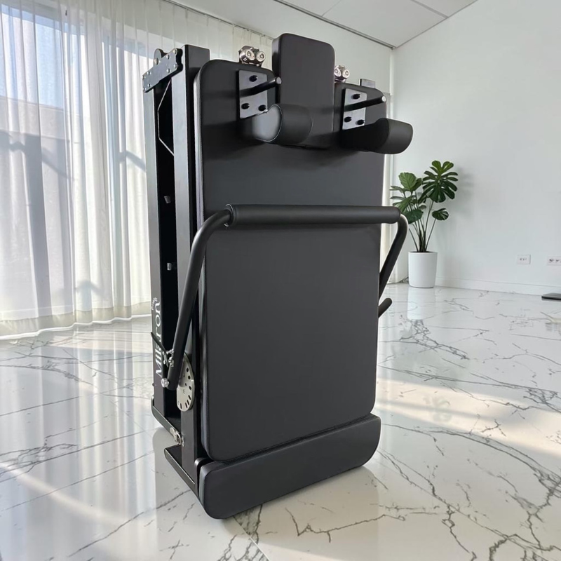 Milaron Pearl V3 Foldable Reformer Pilates Machine in Noir in folded position