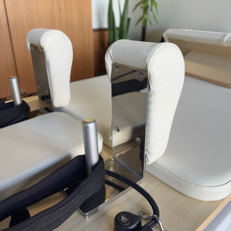 Close-up of shoulder blocks on Milaron Pearl V3 Studio Reformer in Creme