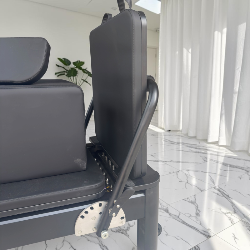 Footbar on the Milaron Pearl V3 Studio Reformer in Noir