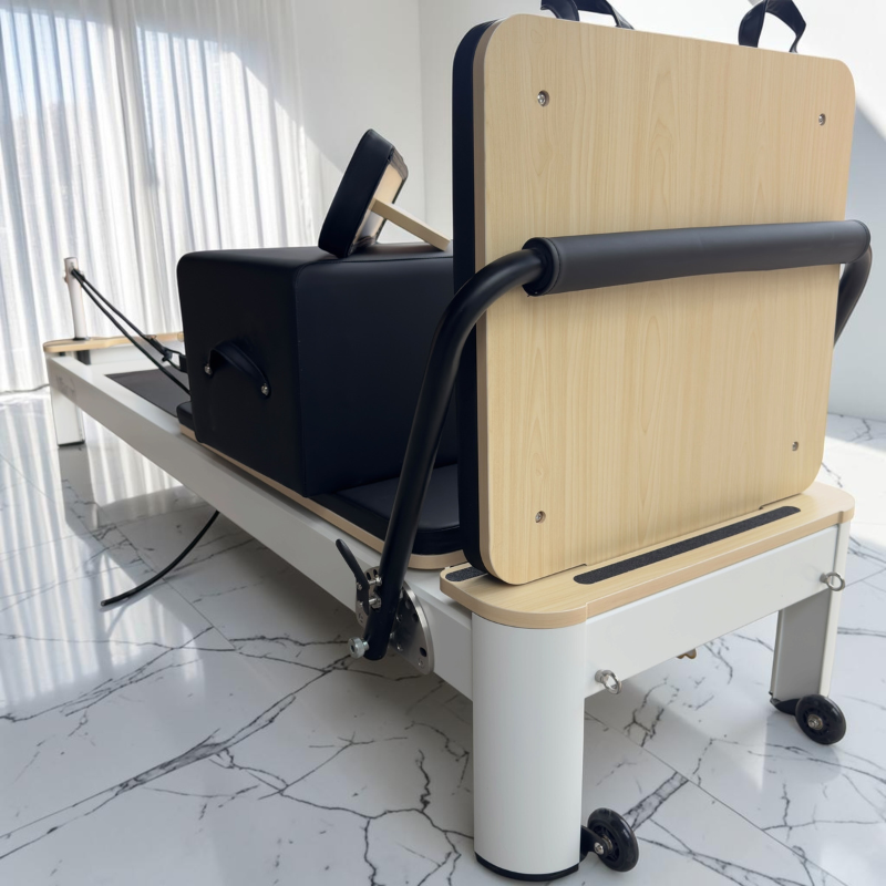 Front of the Milaron Pearl V3 Studio Pilates Reformer Machine in Original with jumpboard on
