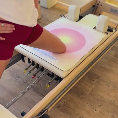 Video of woman exercising with Forme State Reformer Pilates Mat in Golden