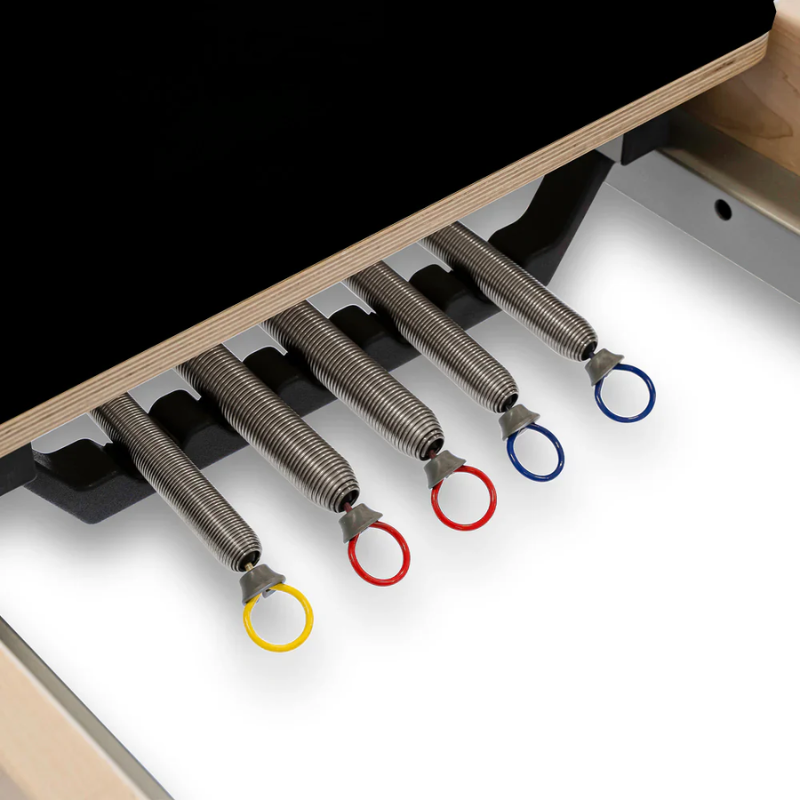 Close-up of the springs that are unattached on Reeplex Cadillac Pilates Reformer with Full Trapeze V2