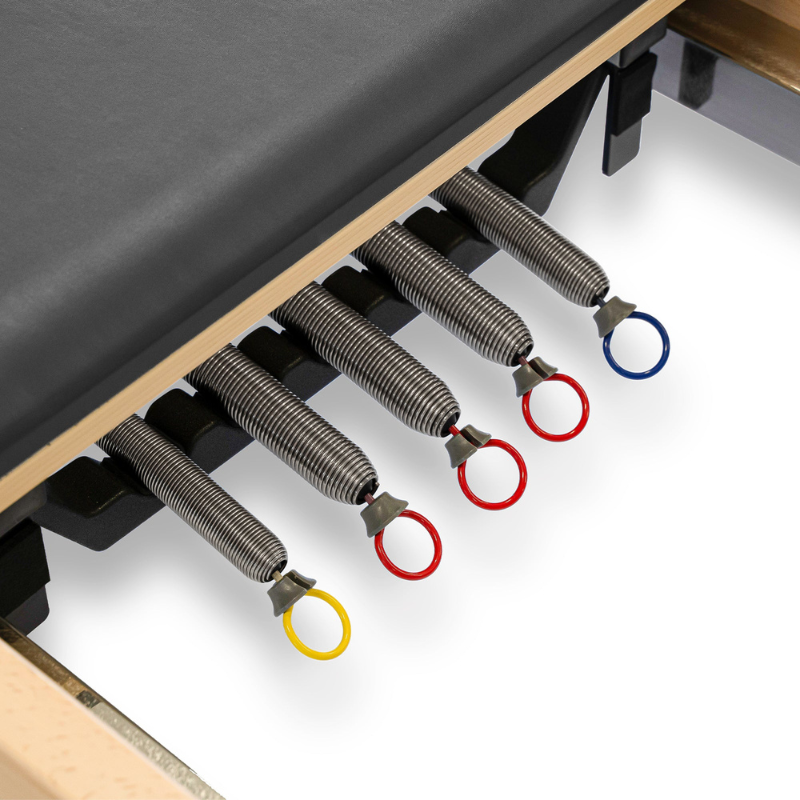 Close-up of the Reeplex Luna Beechwood Pilates Reformer with springs detached