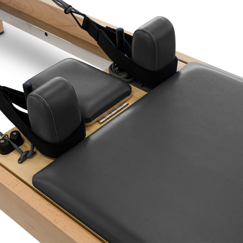 Close-up of the Reeplex Luna Beechwood Pilates Reformer carriage