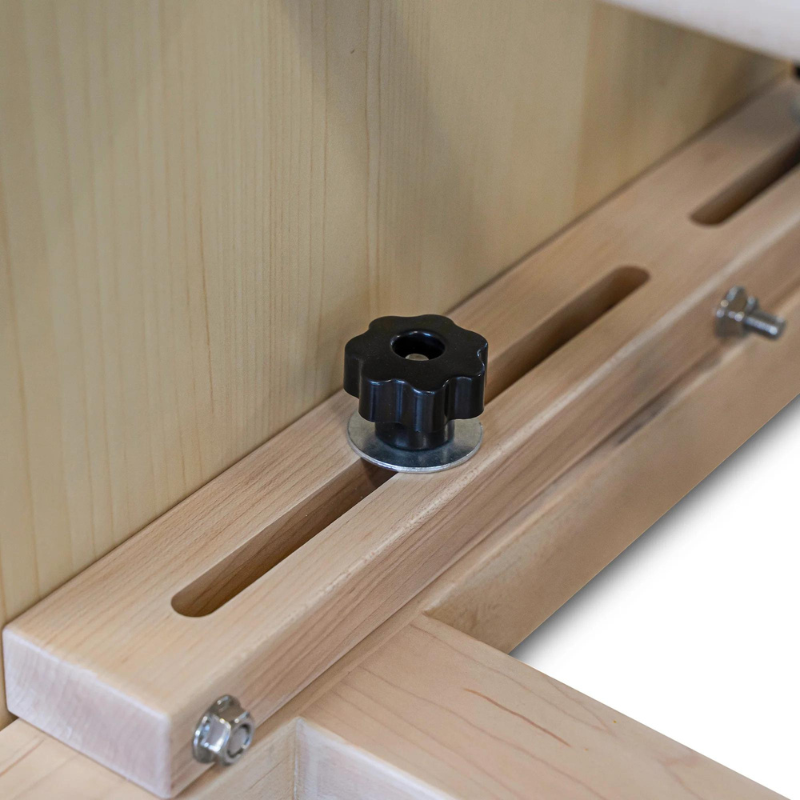 Close-up view of the adjustment knob on the Reeplex Pilates Ladder Barrel