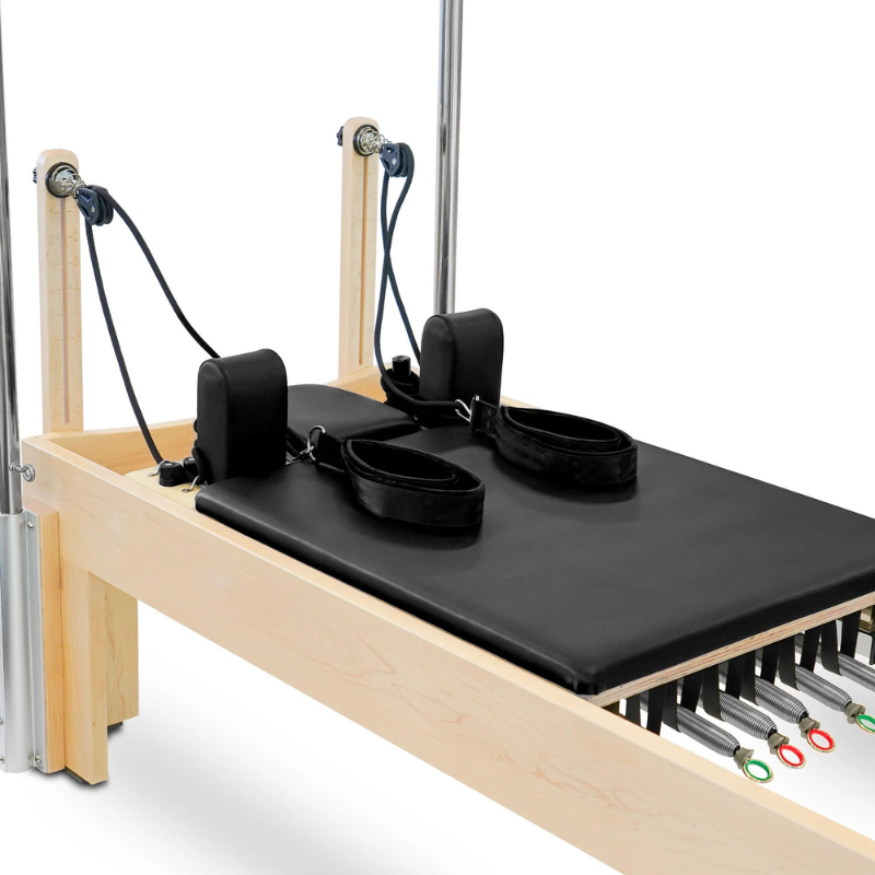 Close-up view of the carriage of the Reeplex Pilates Reformer Pro Maple Wood with Full Trapeze Frame