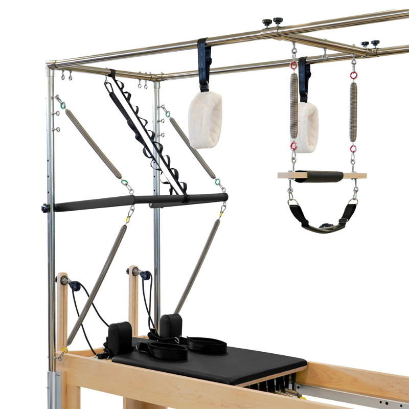 Closer left side view of the Reeplex Pilates Reformer Pro Maple Wood with Full Trapeze Frame