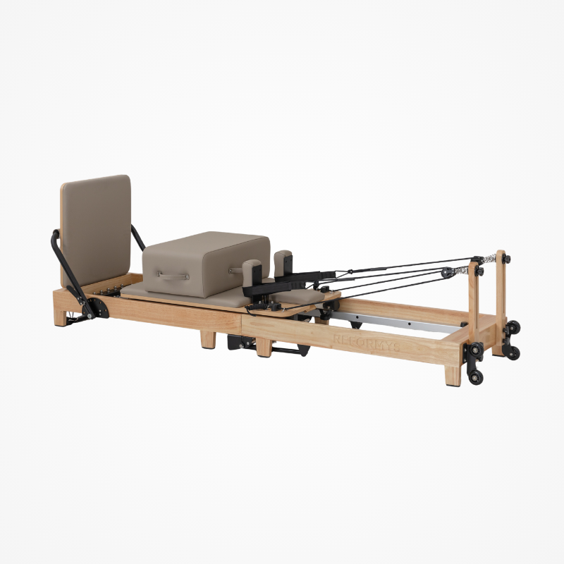 Main photo of the Reformys Cloud Folding Pilates Reformer Machine in Beige