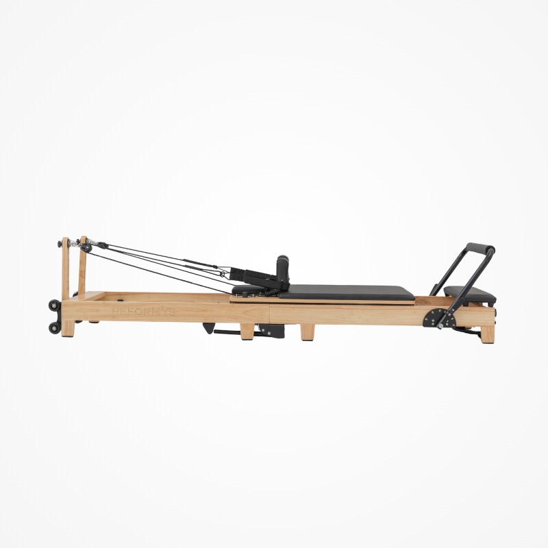 Right side view of Reformys Cloud Folding Pilates Reformer Machine in Black without jumpboard