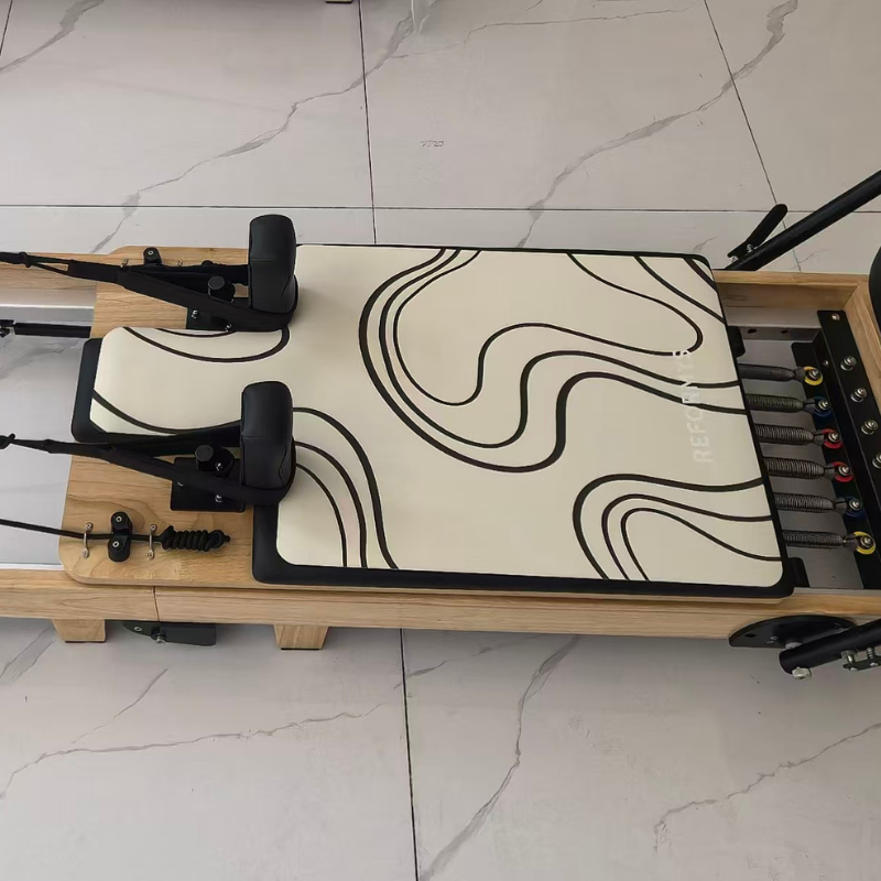 Reformys Pilates Reformer Mat in Contour on a Pilates reformer machine