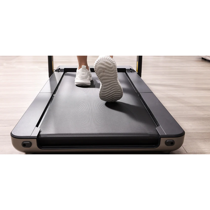 Close-up of a person walking on the WalkingPad X21 Foldable Treadmill running belt